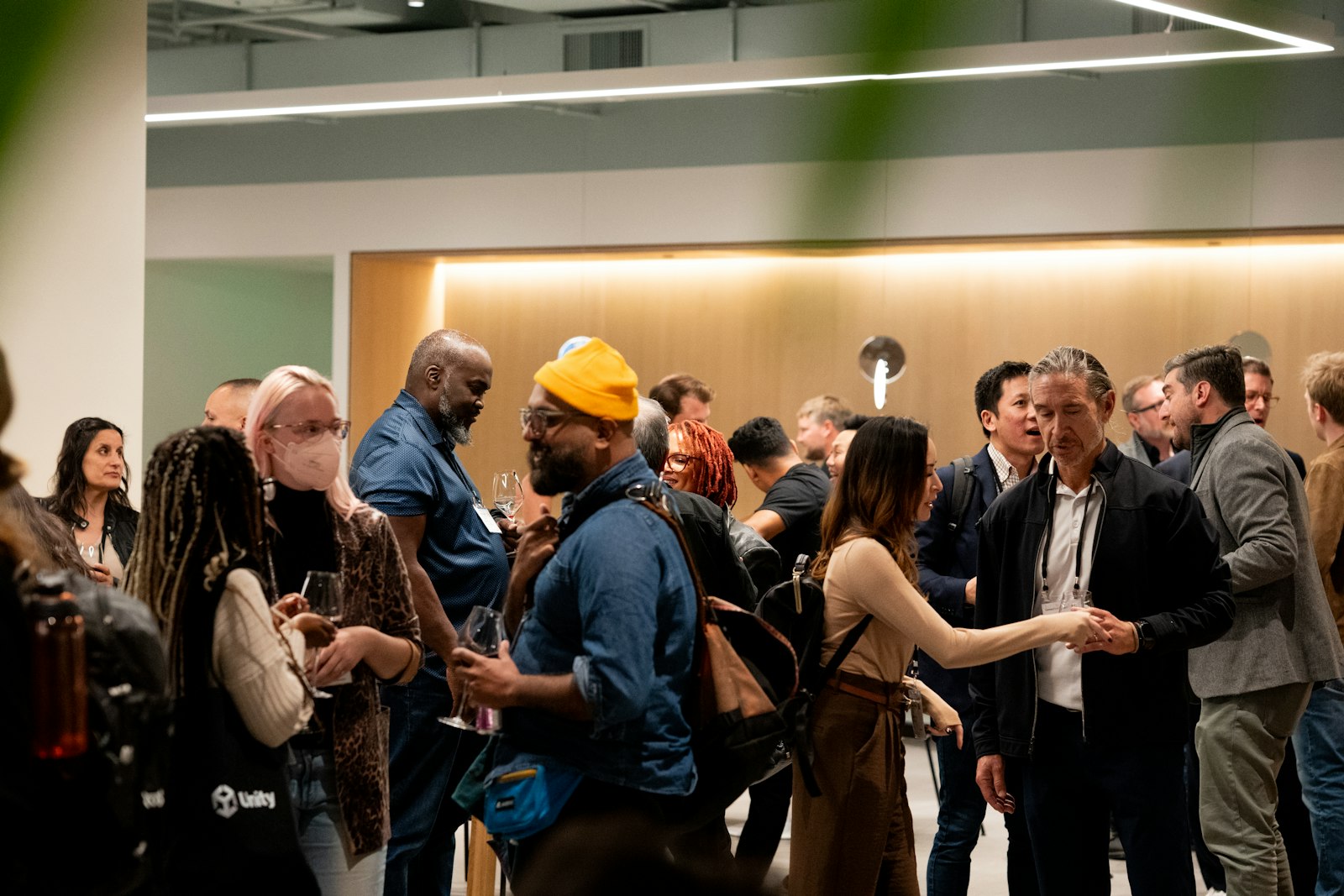Attendees in conversation at a networking event